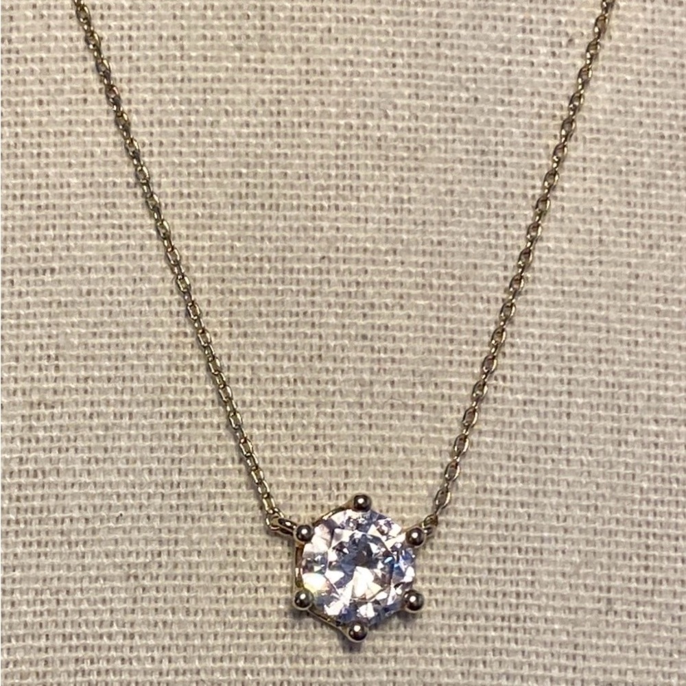 Elegant Gold Necklace with Crystal Pendant